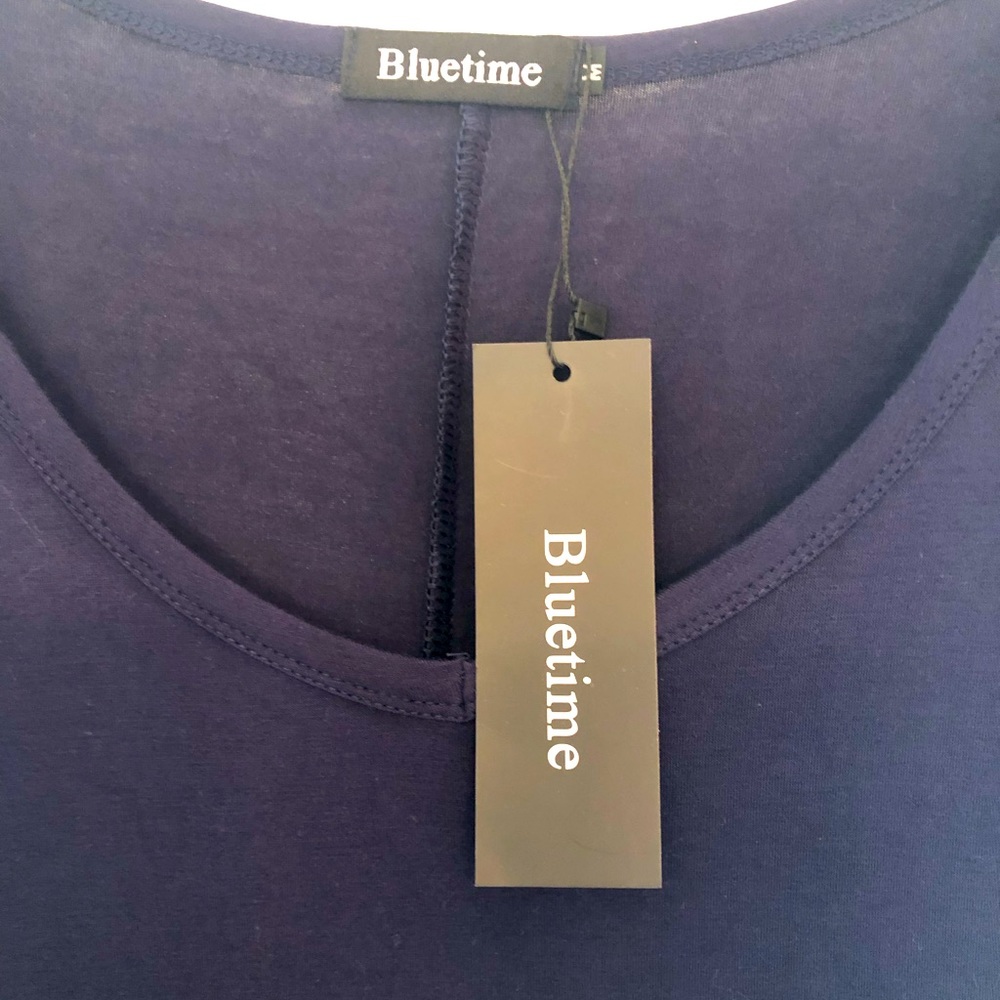 Blue time medium top (great with leggings). New with tag